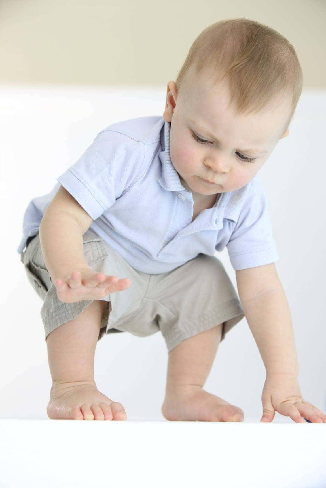 baby learning to stand will your business stand up to an earnings guarantee income guarantee