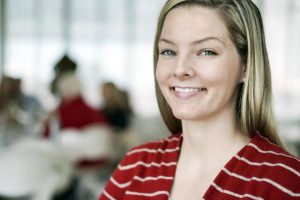 smiling woman working as a bookkeeper