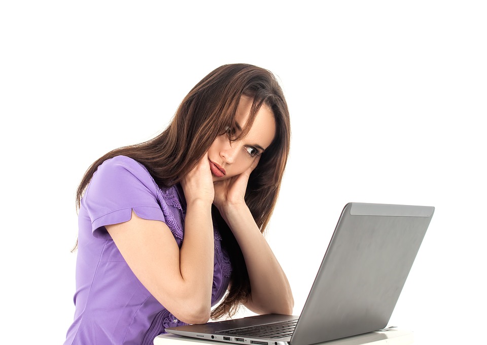 frustrated woman at laptop